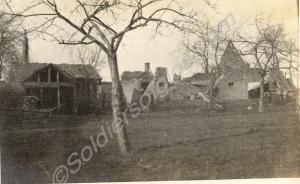 Damaged farm buildings. 1st Battalion, The Glouces