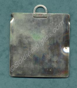 Steel shaving mirror with dents made by bullets. B