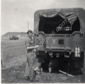 Private Gordon Williams sign writing on a 1 ton tr
