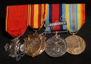 Group of four commemorative medals; including Dunk