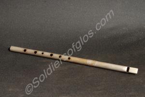 Tin whistle with design of a Guardsman playing a f