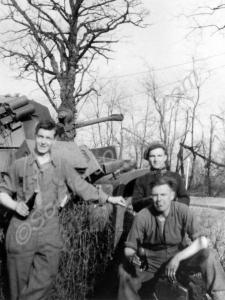 Daimler armoured car with three soldiers. 5623890