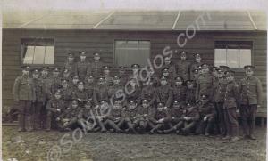 Platoon outside hut. 3121 Private Thomas Edwin Wil