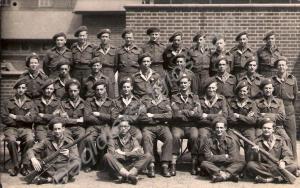 Recruits. Private Eric Cook seated second from rig
