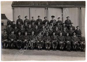 Officers group which features (on the far right, s