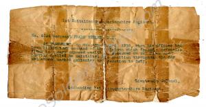 Framed citation for the award of a Military Medal.