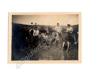 Features World War I soldiers at Sailly washing. B