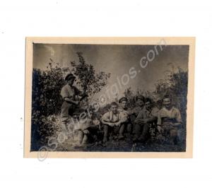 Features World War I soldiers securing material fo