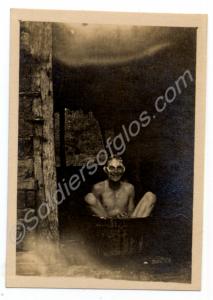 Features World War I soldier washing in the nude [
