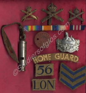 Collection of badges, buttons, insignia and whistl