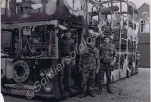 Burned out bus. Gloucestershire Regiment. Belfast.