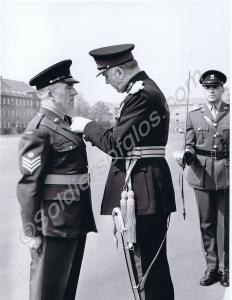 Major-General James Bowes-Lyon presenting Long Ser