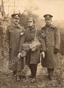Three soldiers, one dressed as a German P.O.W.  23