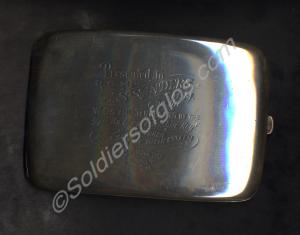 Silver cigarette case. Engraved : "Presented to R.