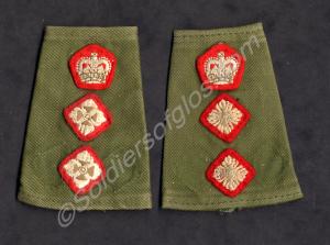 Pair of officer's rank slides, khaki background. W