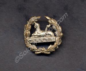 Back badge, white  metal converted to a brooch. 30