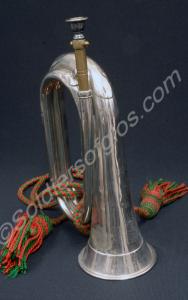 Silver bugle with red and green cord and tassels..