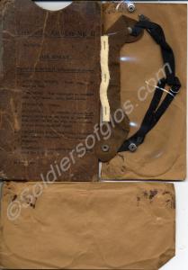 Three anti-gass eye shields Mk II, in browm case.
