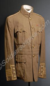 Khaki serge jacket with pleat down back. Worn by L