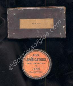 Small rectangular  tin box labeled "WADS"  contain