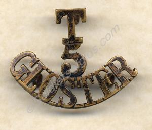 Brass shoulder title worn by 3040/240932 Drummer C