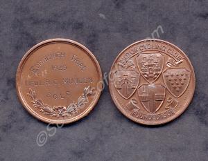 Two bronze medals from the Motor Cycling Club. Edi