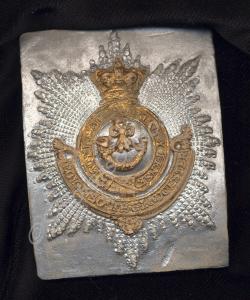 Plaster cast of shoulder belt plate, as worn by th