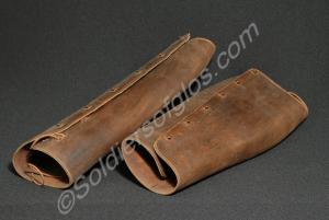 One pair of officer's  brown leather leggings. Man
