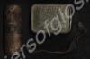 Three metal objects: one sealed metal tin of 'Emer