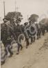 Troops marching, probably in England. 1st Battalio