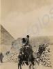 Ladies' camel ride by the Pyramids. 1st Battalion,