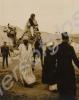 Ladies' camel ride by the Pyramids. 1st Battalion,
