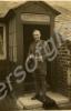 Soldier standing by porch. Gloucestershire Regimen
