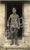 Sergeant standing in a doorway. 1/4th Battalion, T