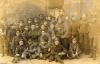 Informal group, including several boy soldiers. Th