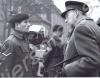 Lance-Corporal Tony Cook talking to General Sir De