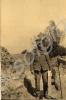 Soldier with goggles, smoking pipe and a piece of