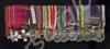 Complete set of fifteen miniature medals belonging